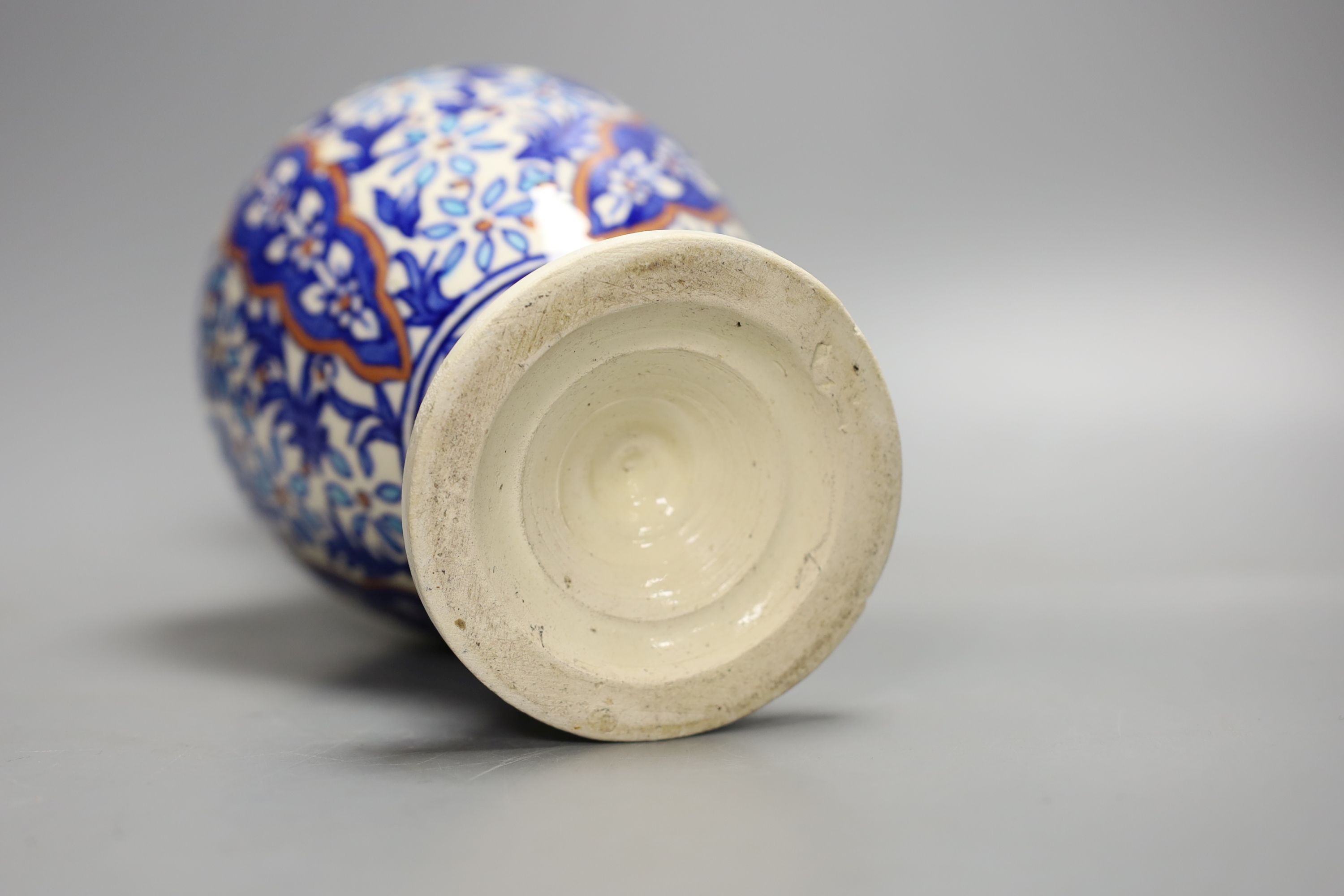 A Turkish Iznik style earthenware ewer, 20th century, 31. 5 cm high